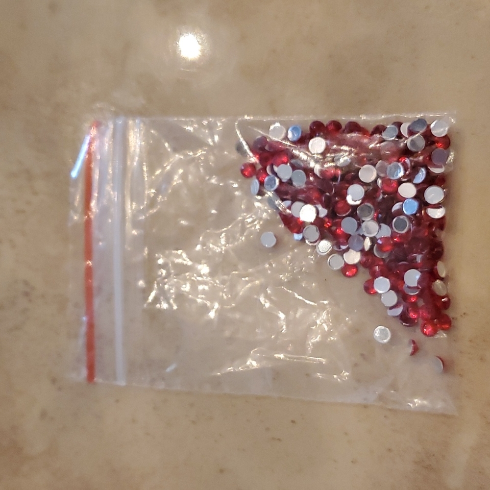 Red faux jewels